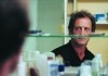 La Moustache - Marc (Vincent Lindon), shaved, staring...irror